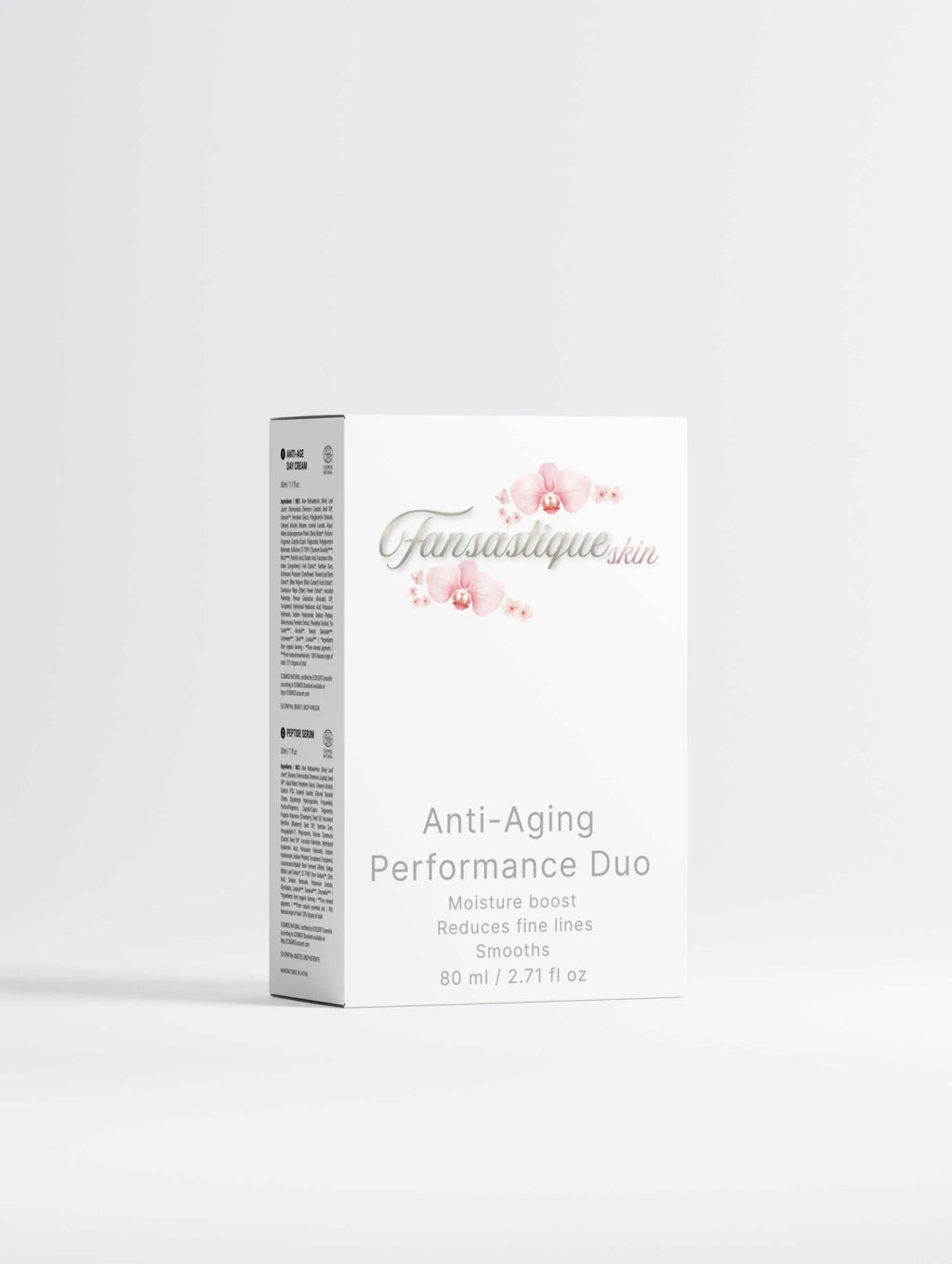 Witte verpakking van anti-aging skincare duo met orchideeën en productinformatie.