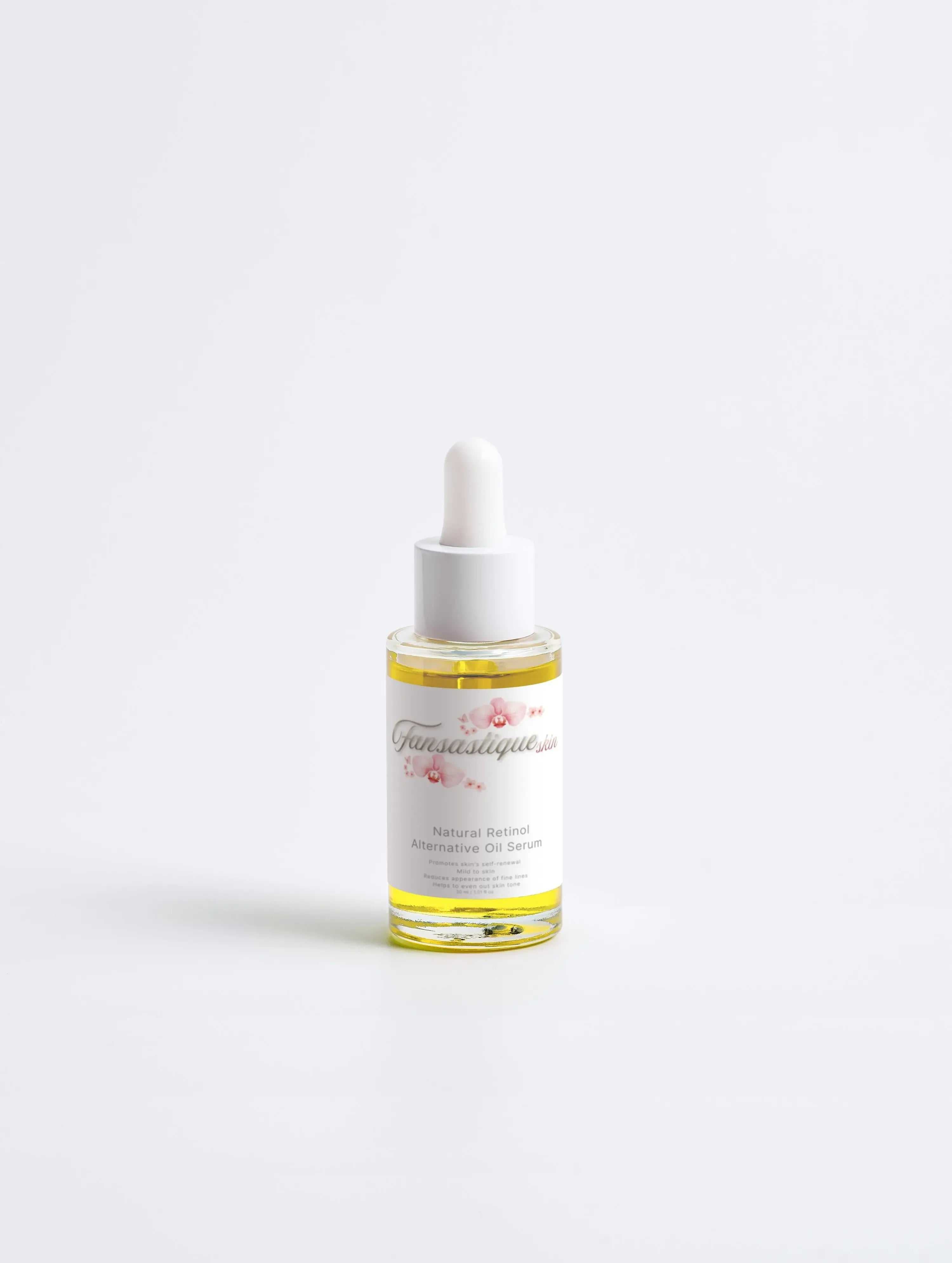 Glazen flesje met gezichtsolie serum, pipetdop, tegen witte achtergrond, skincare product